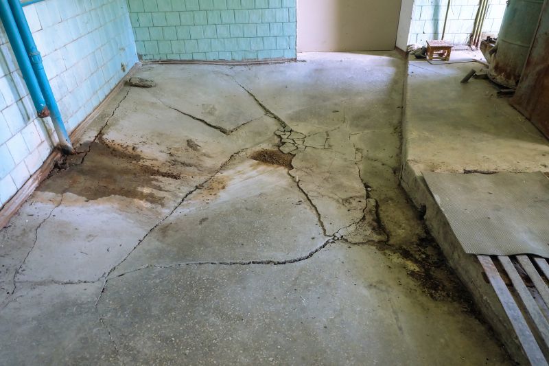Repairing cracked concrete slab